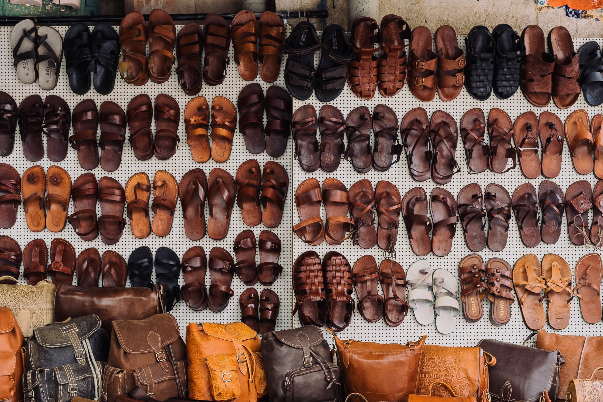 Image of many different types of shoes symbolizing the various stakeholders healthcare and community-based organizations must communicate with.
