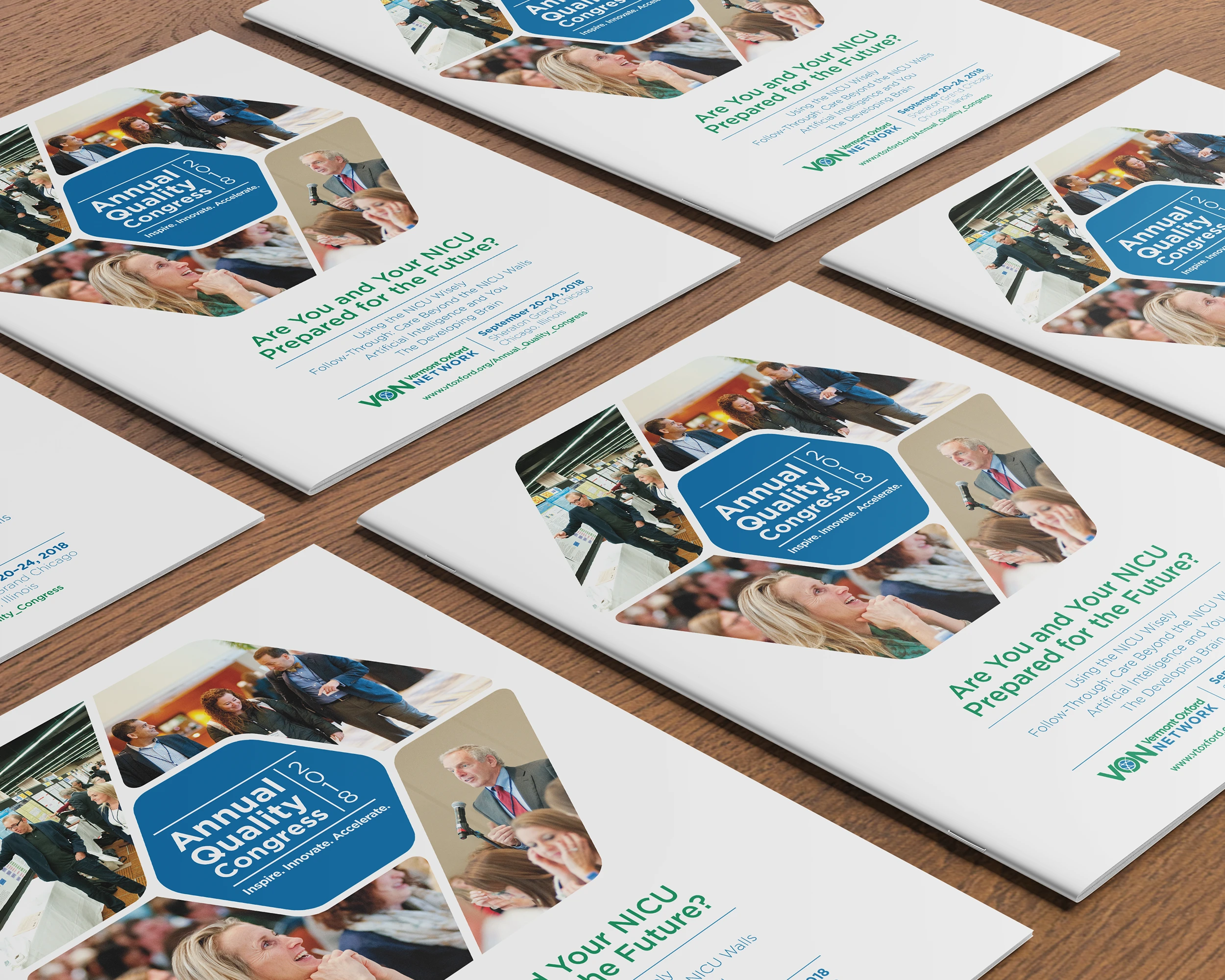 Stack of printed event guides for the Vermont Oxford Network's 2018 Annual Quality Congress, featuring conference branding and NICU-focused content.